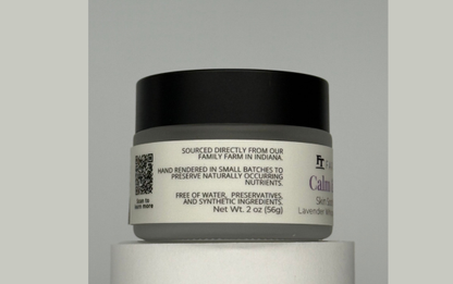 Jar of Calming Skin Cream on a gray background