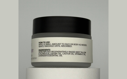 Skincare jar with black lid and gray label on a light gray background