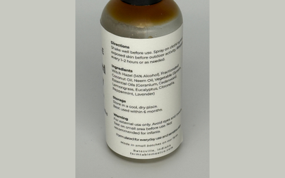 Bottle with label on a gray background