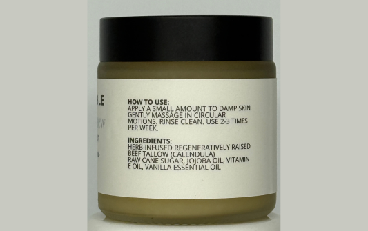 Cosmetic jar with label on a white background
