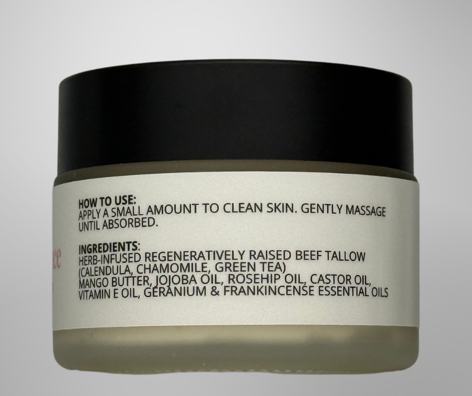 Jar of skincare product with label on a gray background